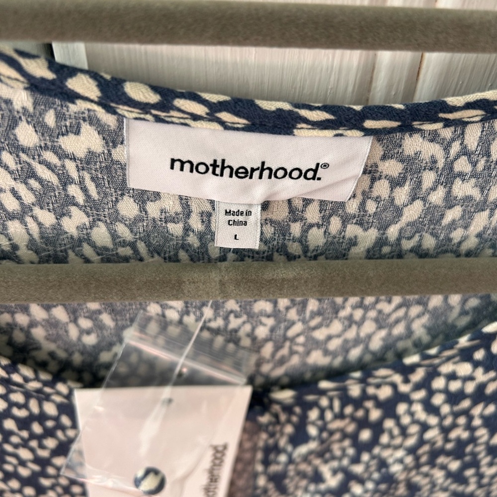 Motherhood Navy and White Patterned Blouse with Bell Sleeves and Flounce Bottom - Picture 3 of 6